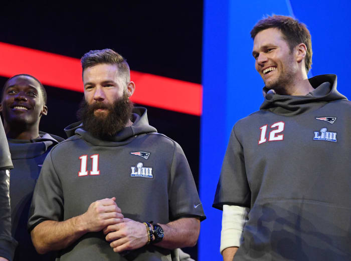 New England Patriots quarterback Tom Brady and wide receiver Julian Edelman during Opening Night for Super Bowl LIII at State Farm Arena.